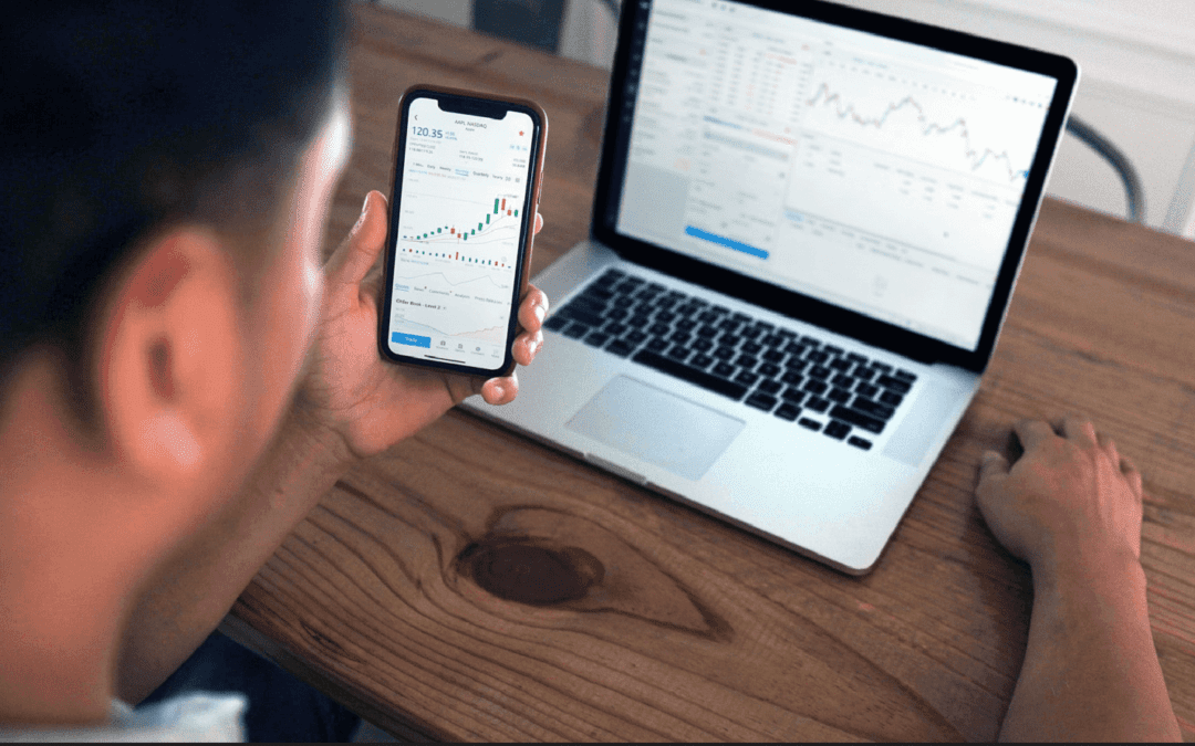 man looking at devices