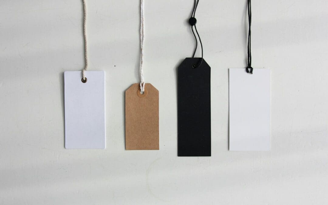 four paper card tags